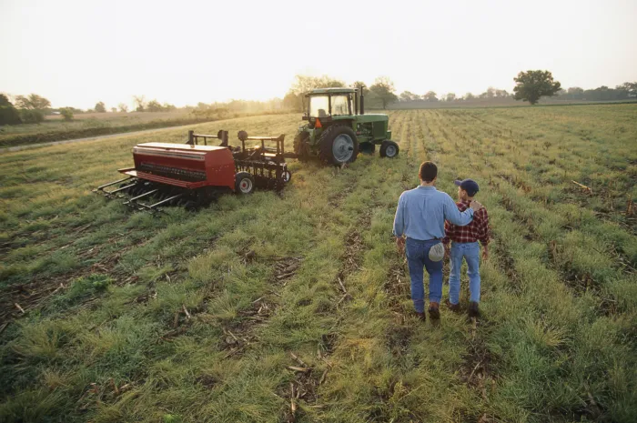 famer and son in the field