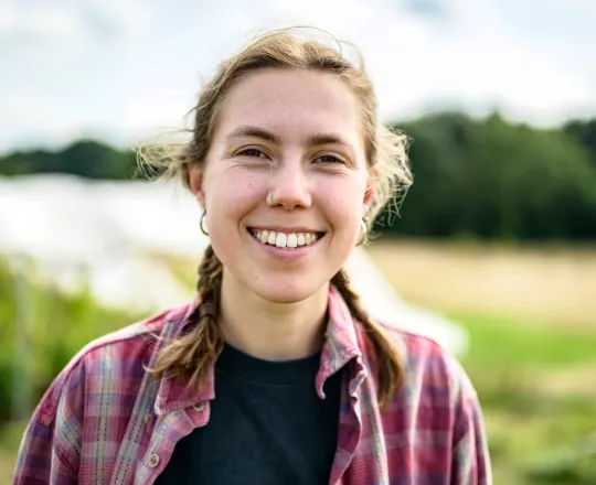 smiling young female farmer