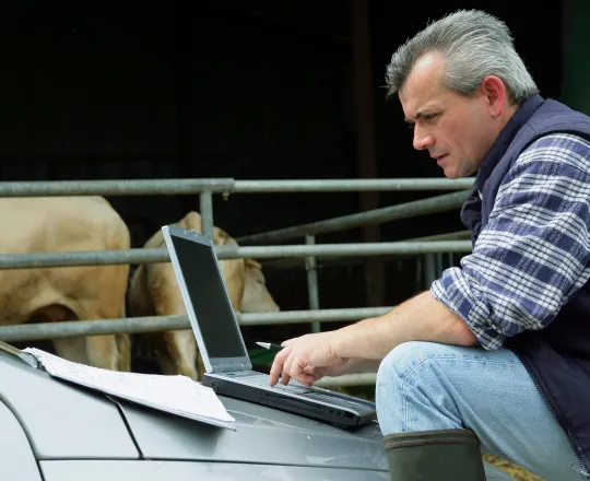 Farmer on laptop
